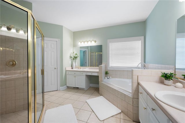 223 Oak Grove Dr, Dallas, GA 30157 - bathroom with a stall shower, two vanities, a bath, and tile patterned floors