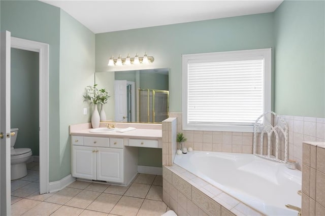 223 Oak Grove Dr, Dallas, GA 30157 - full bath with a bath, vanity, tile patterned flooring, a shower stall, and toilet