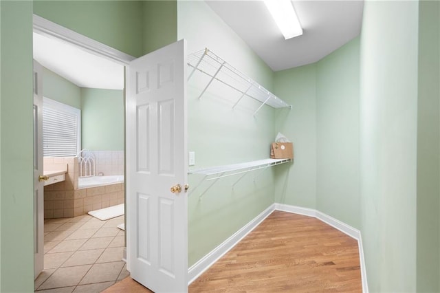 223 Oak Grove Dr, Dallas, GA 30157 - walk in closet with tile patterned flooring