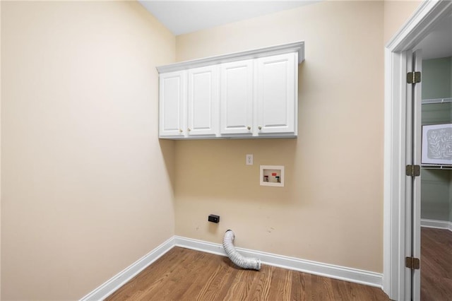 223 Oak Grove Dr, Dallas, GA 30157 - laundry area featuring wood finished floors, washer hookup, electric dryer hookup, and baseboards