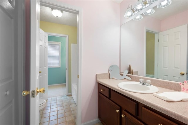 223 Oak Grove Dr, Dallas, GA 30157 - bathroom with vanity, toilet, tile patterned floors, and baseboards