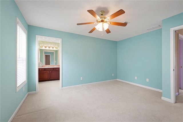 223 Oak Grove Dr, Dallas, GA 30157 - unfurnished bedroom featuring light carpet, baseboards, multiple windows, and connected bathroom