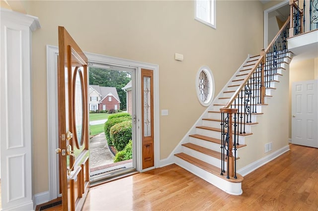 223 Oak Grove Dr, Dallas, GA 30157 - entryway featuring stairs, light wood-type flooring, baseboards, and a high ceiling