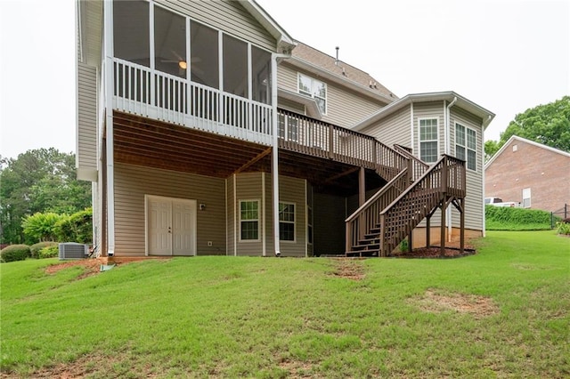 223 Oak Grove Dr, Dallas, GA 30157 - rear view of property with a deck, a lawn, stairway, and a sunroom