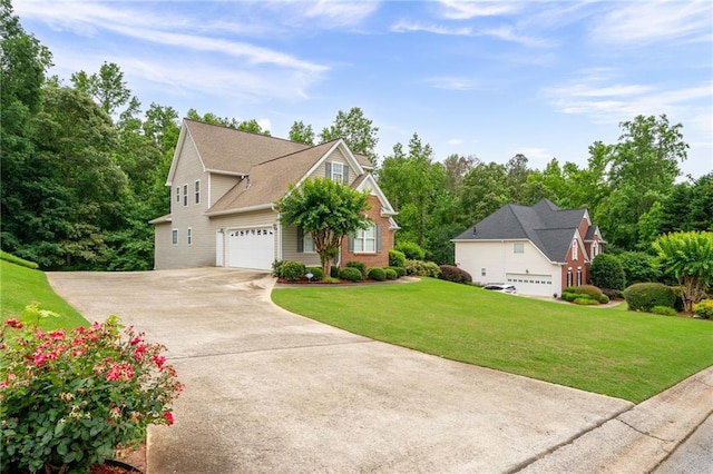 223 Oak Grove Dr, Dallas, GA 30157 - view of front of home with driveway, a front lawn, and a garage