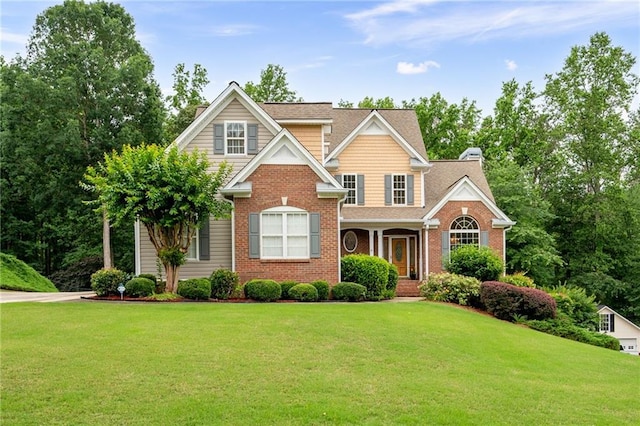 223 Oak Grove Dr, Dallas, GA 30157 - traditional-style house with a front yard and brick siding