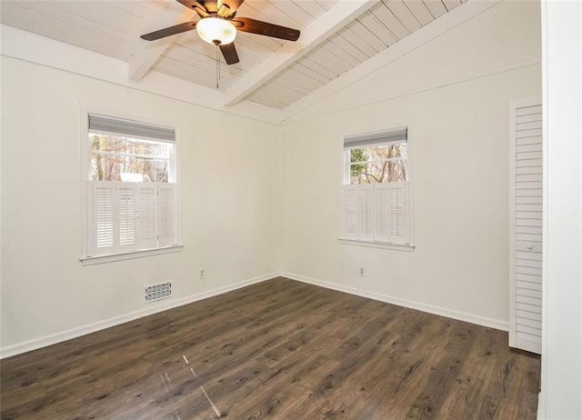 empty room featuring vaulted ceiling with beams, ceiling fan, dark hardwood / wood-style flooring, and wooden ceiling