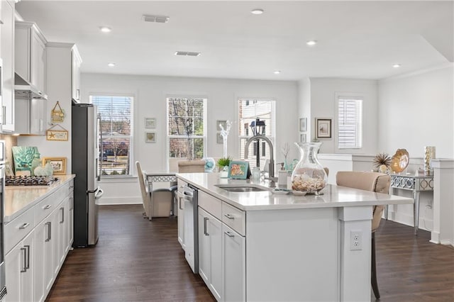 kitchen featuring plenty of natural light, visible vents, appliances with stainless steel finishes, and a sink