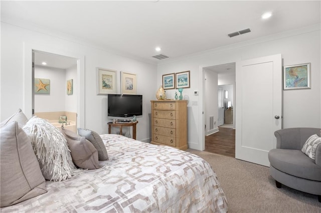 carpeted bedroom with recessed lighting, visible vents, baseboards, and crown molding