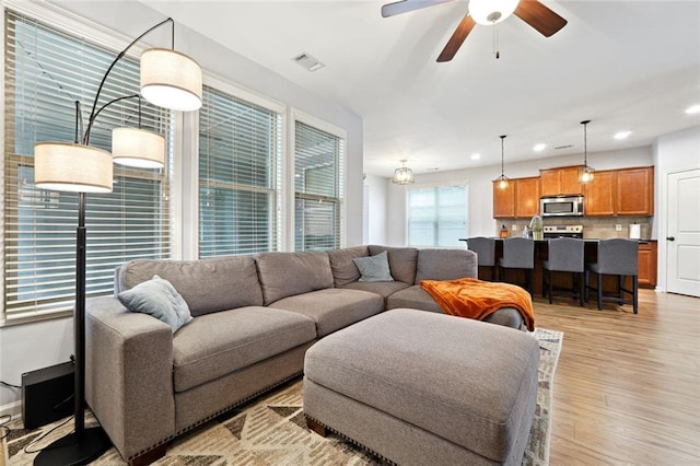5925 Watersdown Way, Flowery Branch, GA 30542 - living room with light wood-style flooring, ceiling fan, and recessed lighting