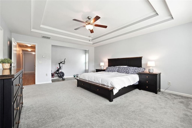 5925 Watersdown Way, Flowery Branch, GA 30542 - carpeted bedroom with a tray ceiling, baseboards, a ceiling fan, and ornamental molding