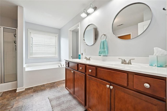 5925 Watersdown Way, Flowery Branch, GA 30542 - full bathroom featuring a bath, double vanity, and a stall shower