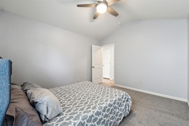 5925 Watersdown Way, Flowery Branch, GA 30542 - carpeted bedroom with lofted ceiling, baseboards, and a ceiling fan