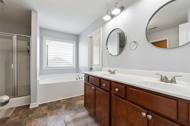 bathroom featuring a bath, a sink, double vanity, visible vents, and a shower stall