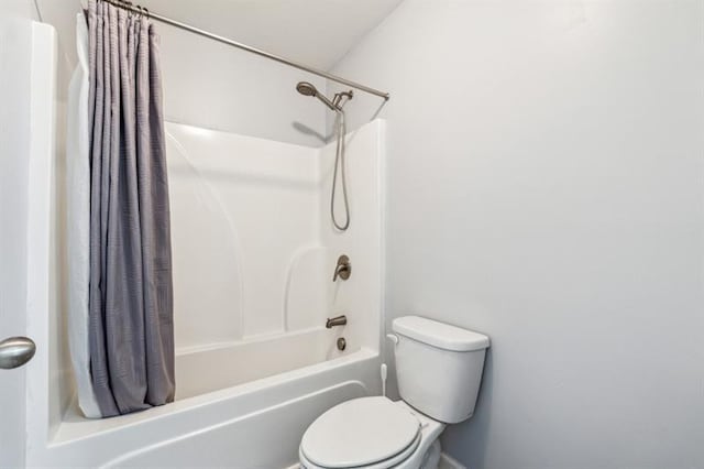 5925 Watersdown Way, Flowery Branch, GA 30542 - bathroom with shower / bath combination with curtain and toilet