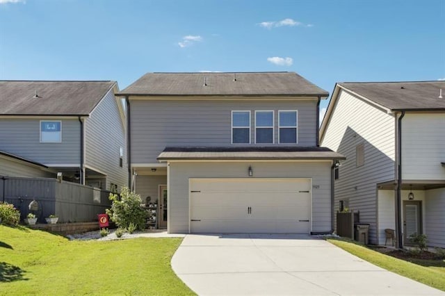 5925 Watersdown Way, Flowery Branch, GA 30542 - back of property with a garage and driveway