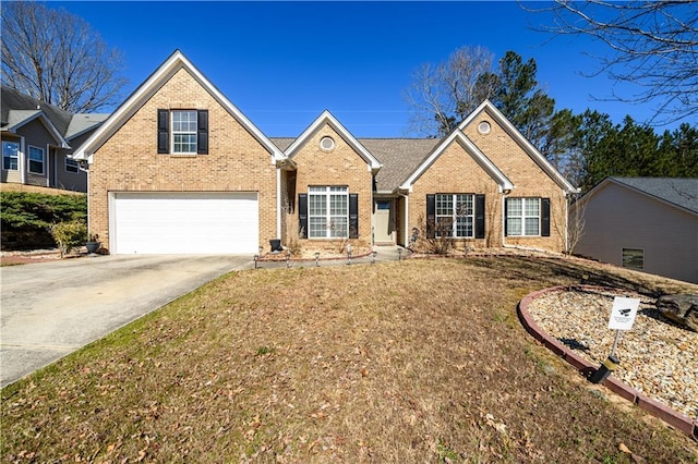 view of front facade with concrete driveway, brick siding, and an attached garage