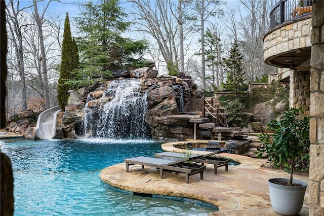 pool with a patio area