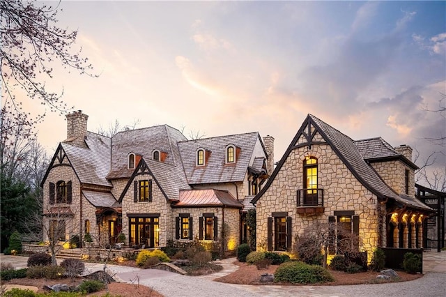 view of front of property with a chimney