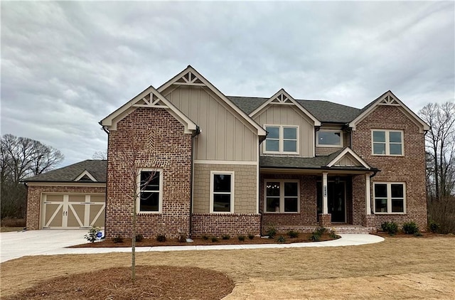 craftsman-style house featuring a front lawn and a garage