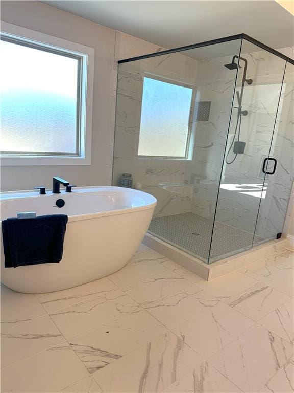 bathroom with independent shower and bath