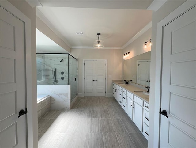 bathroom with vanity, separate shower and tub, and ornamental molding