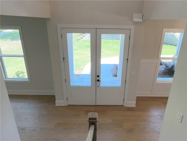 doorway featuring a healthy amount of sunlight and french doors