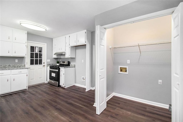 2722 Spring Side Ct, Douglasville, GA 30135 - kitchen with gas stove, under cabinet range hood, baseboards, white cabinets, and dark wood-style flooring