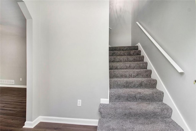 2722 Spring Side Ct, Douglasville, GA 30135 - staircase with wood finished floors and baseboards