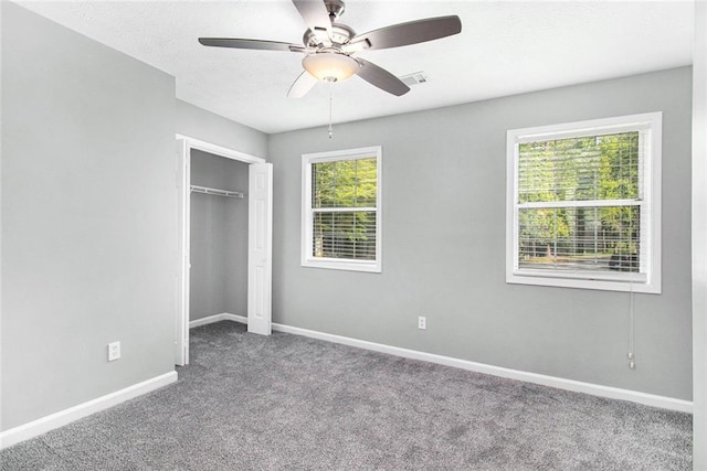 2722 Spring Side Ct, Douglasville, GA 30135 - unfurnished bedroom featuring carpet, baseboards, a closet, and ceiling fan