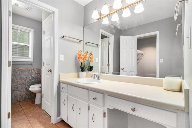 2722 Spring Side Ct, Douglasville, GA 30135 - bathroom with tile patterned floors, vanity, and toilet