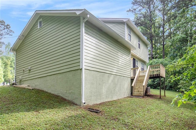2722 Spring Side Ct, Douglasville, GA 30135 - view of home's exterior with stairway, a deck, and a yard