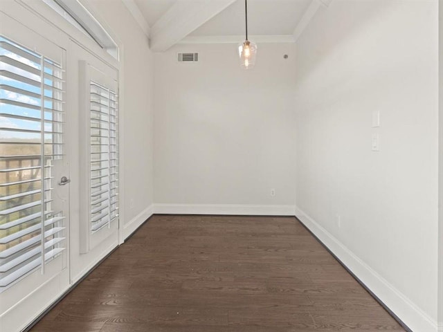 empty room with crown molding, dark hardwood / wood-style flooring, and beam ceiling