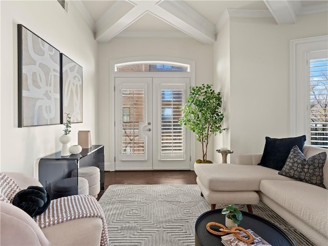 interior space featuring beamed ceiling, wood-type flooring, coffered ceiling, and french doors