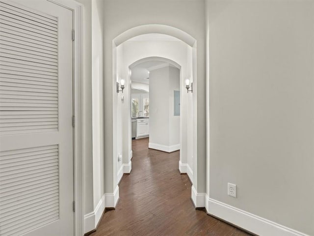 hall with dark wood-type flooring