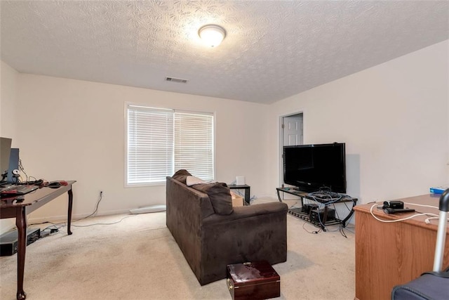 3265 Watson Gate Rd, Loganville, GA 30052 - living room with light carpet, a desk, a textured ceiling, and baseboards