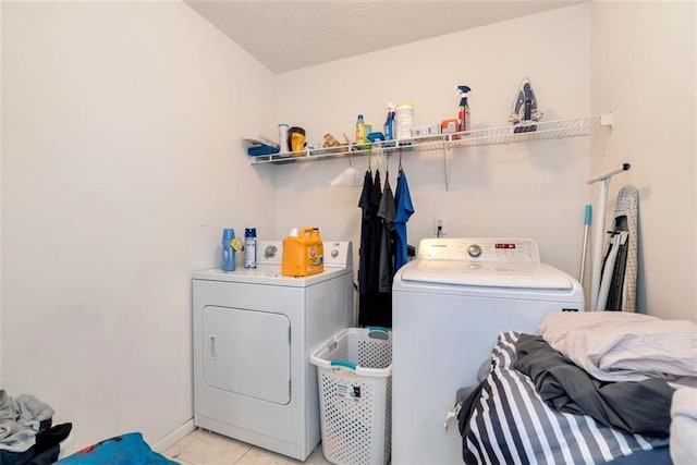 3265 Watson Gate Rd, Loganville, GA 30052 - laundry room featuring independent washer and dryer and light tile patterned floors