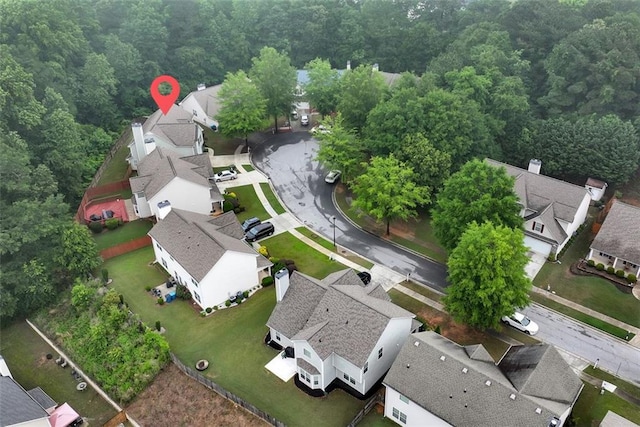 3265 Watson Gate Rd, Loganville, GA 30052 - aerial view of residential area with a heavily wooded area