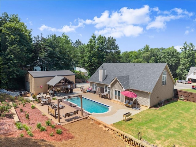 69 Maple Leaf Ct, Hoschton, GA 30548 - view of pool with a patio area, a gazebo, an outbuilding, an outdoor living space, and view of wooded area