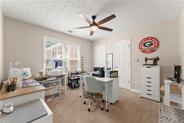 69 Maple Leaf Ct, Hoschton, GA 30548 - home office featuring ceiling fan, a textured ceiling, and light colored carpet