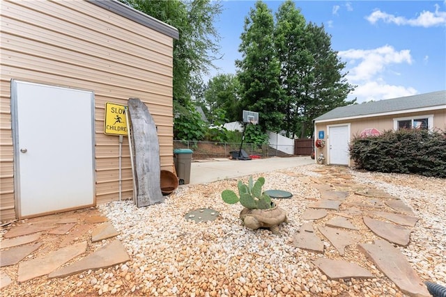 69 Maple Leaf Ct, Hoschton, GA 30548 - view of yard featuring a patio