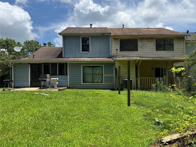 8170 Canyon Forge Dr, Riverdale, GA 30274 - back of house featuring a patio area and a lawn