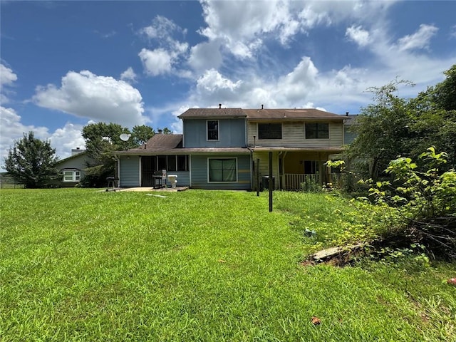 8170 Canyon Forge Dr, Riverdale, GA 30274 - rear view of property featuring a lawn