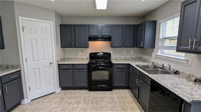 kitchen with black appliances, exhaust hood, a sink, light countertops, and a textured ceiling