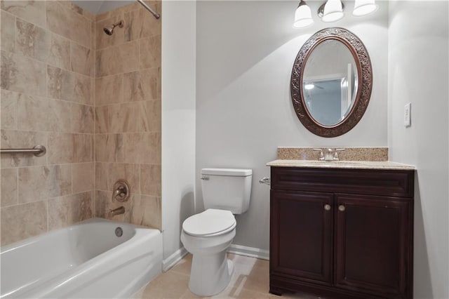 full bathroom featuring tiled shower / bath, vanity, toilet, and tile patterned floors