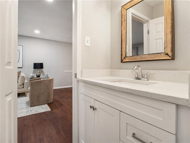 3149 Buford Hwy Unit 3, Brookhaven, GA 30329 - bathroom featuring wood finished floors, vanity, recessed lighting, and baseboards