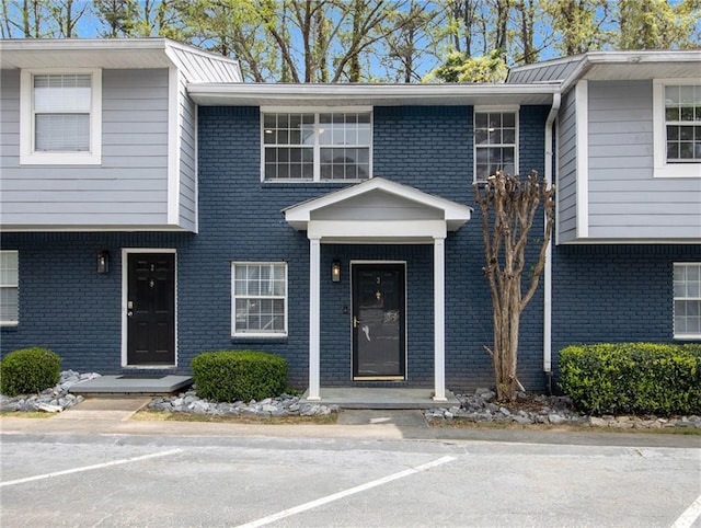 3149 Buford Hwy Unit 3, Brookhaven, GA 30329 - view of front of property featuring uncovered parking and brick siding