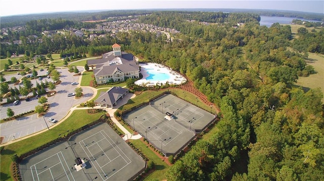 aerial view featuring a wooded view