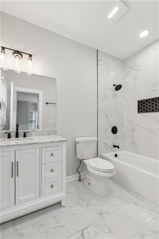 full bath featuring vanity, toilet, marble finish floor, baseboards, and  shower combination