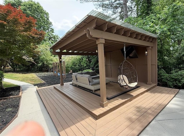 deck featuring fence and an outdoor hangout area
